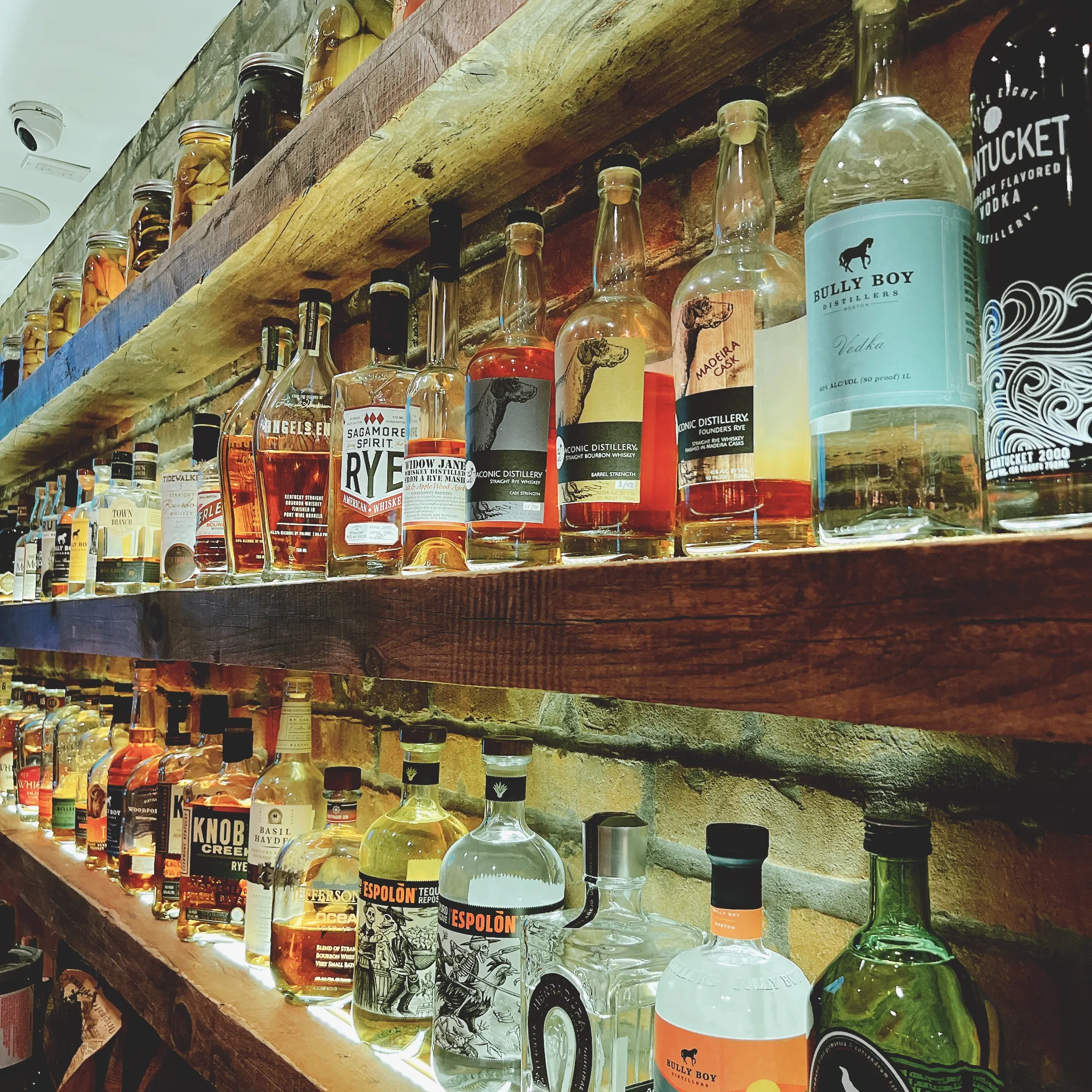 Local distillery spirits behind the bar