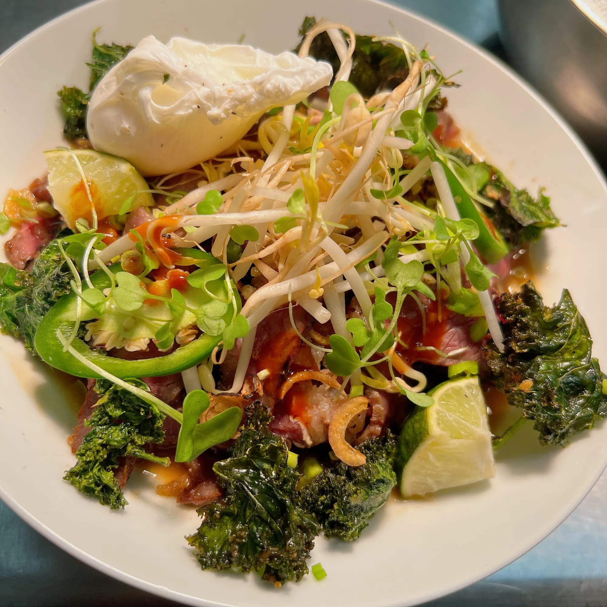 Steak pho with poached egg & crispy kale