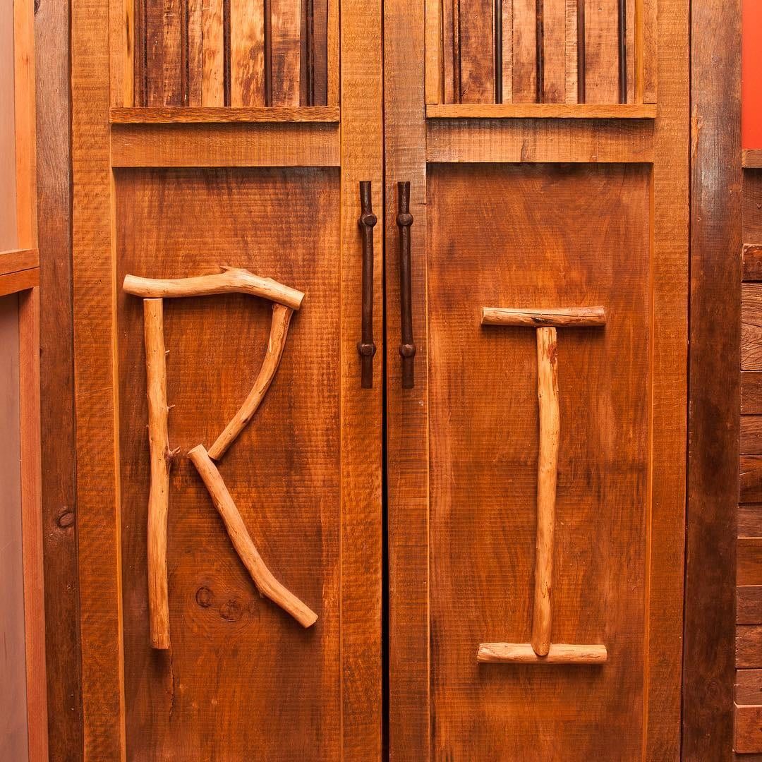 The driftwood R I on Rogue Island's doors in The Arcade