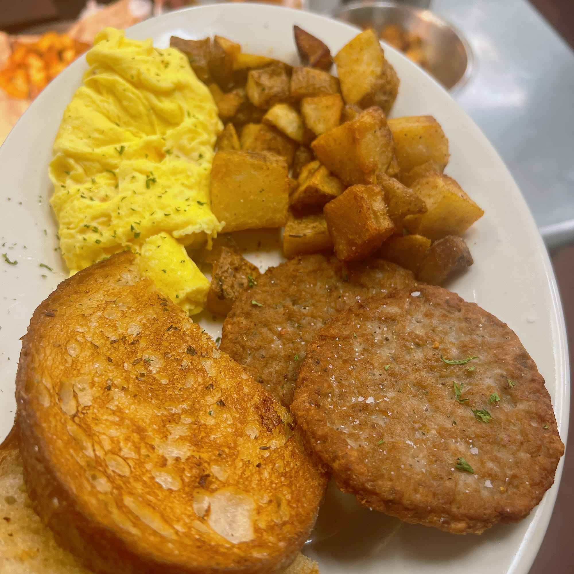 The Rogue Breakfast — farm eggs, home fries, house sausage