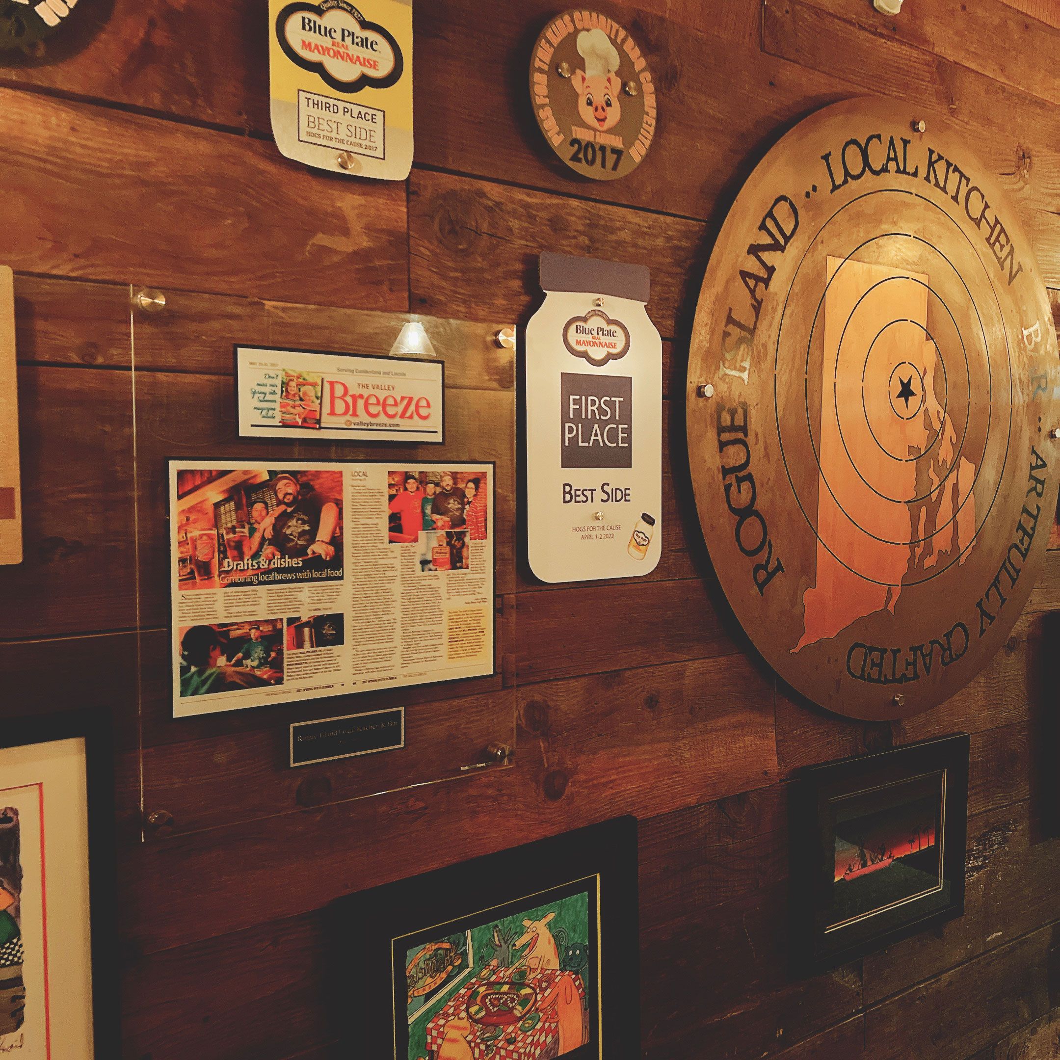 Awards and press on the wall at Rogue Island